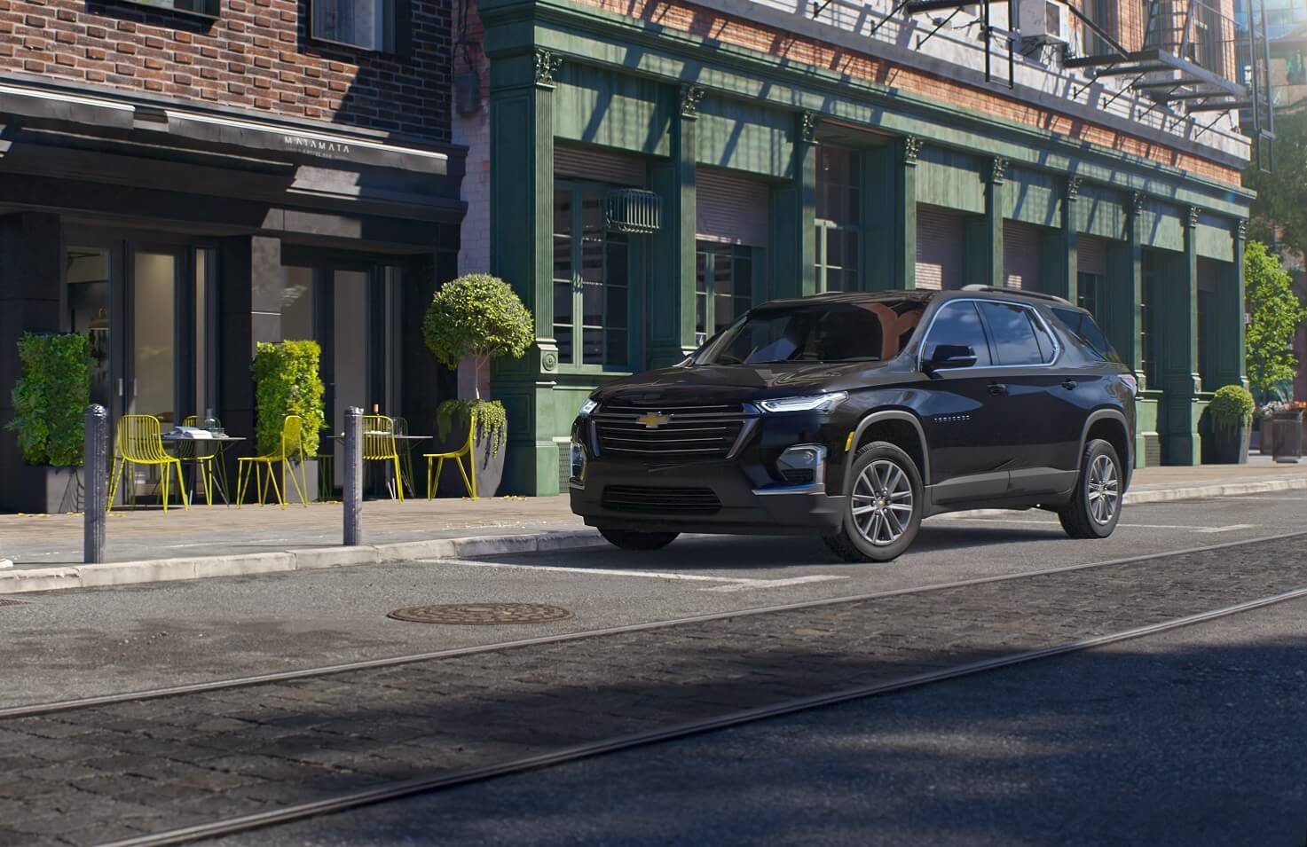 Chevy Traverse SUV parked outside Sunrise Chevrolet Buick GMC at Collierville